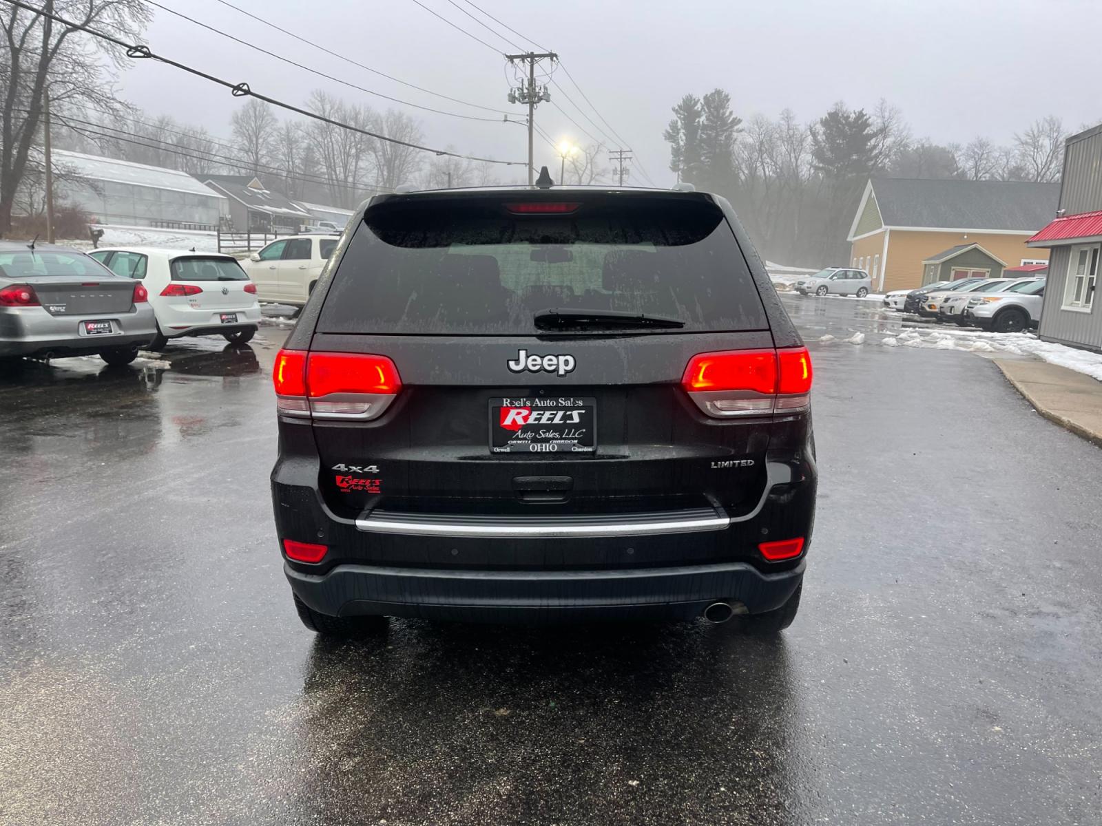 2015 Black /Black Jeep Grand Cherokee Limited 4WD (1C4RJFBG2FC) with an 3.6L V6 DOHC 24V FFV engine, 8-Speed Automatic transmission, located at 11115 Chardon Rd. , Chardon, OH, 44024, (440) 214-9705, 41.580246, -81.241943 - Photo #9